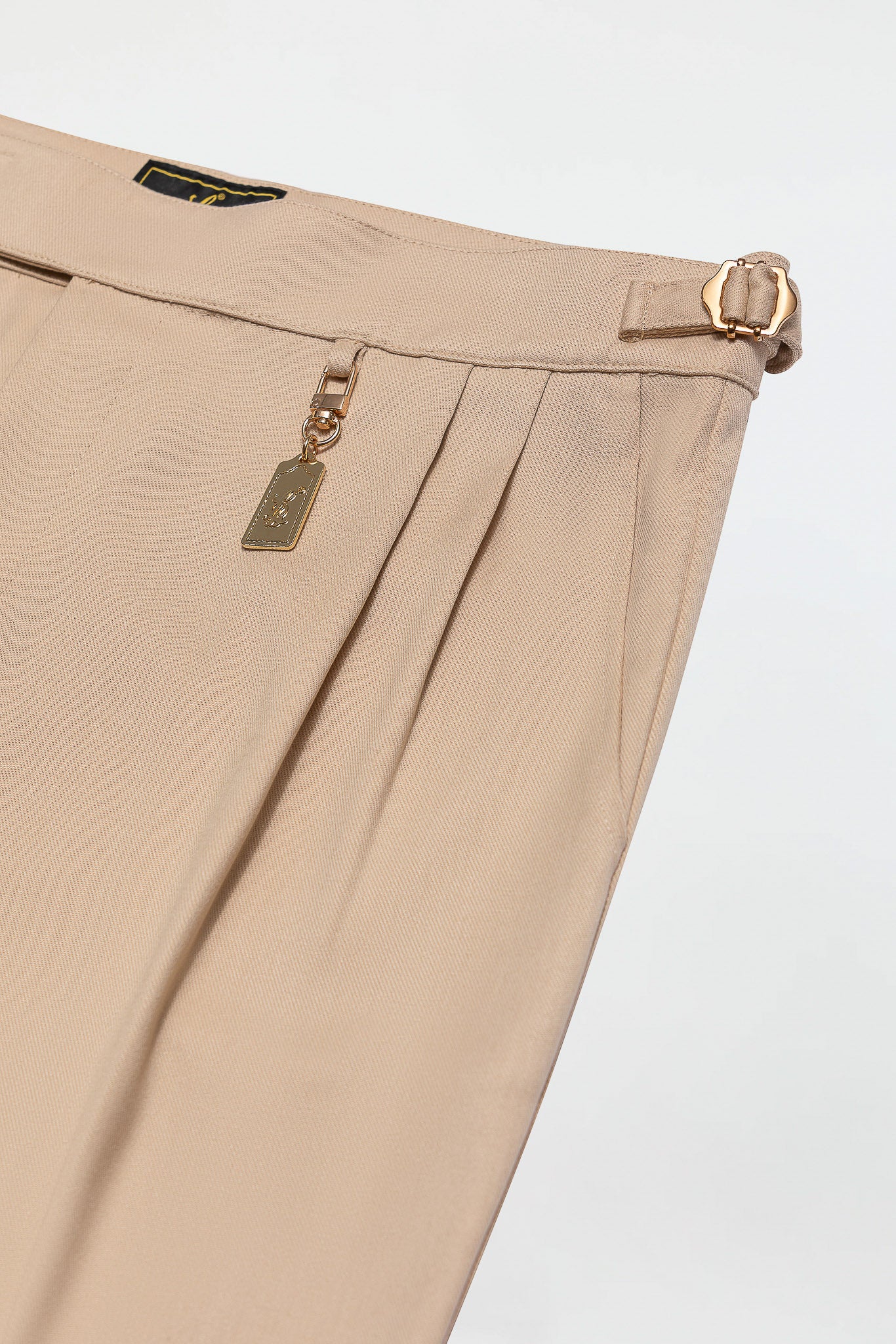 PLEATED PANTS – BEIGE