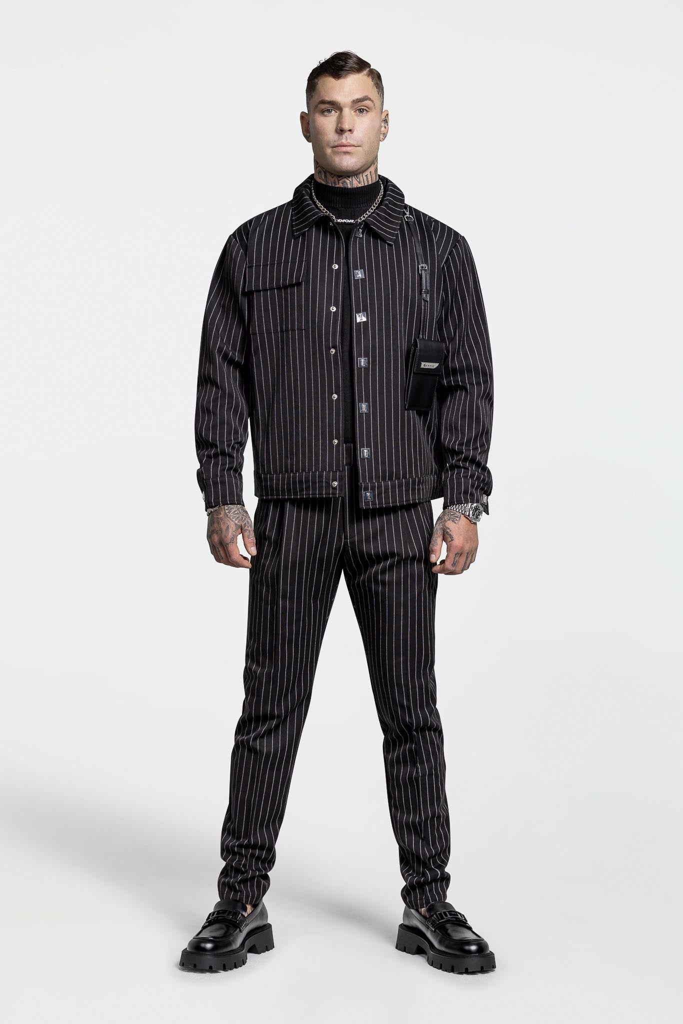 PLEATED PANTS – BLACK PINSTRIPE